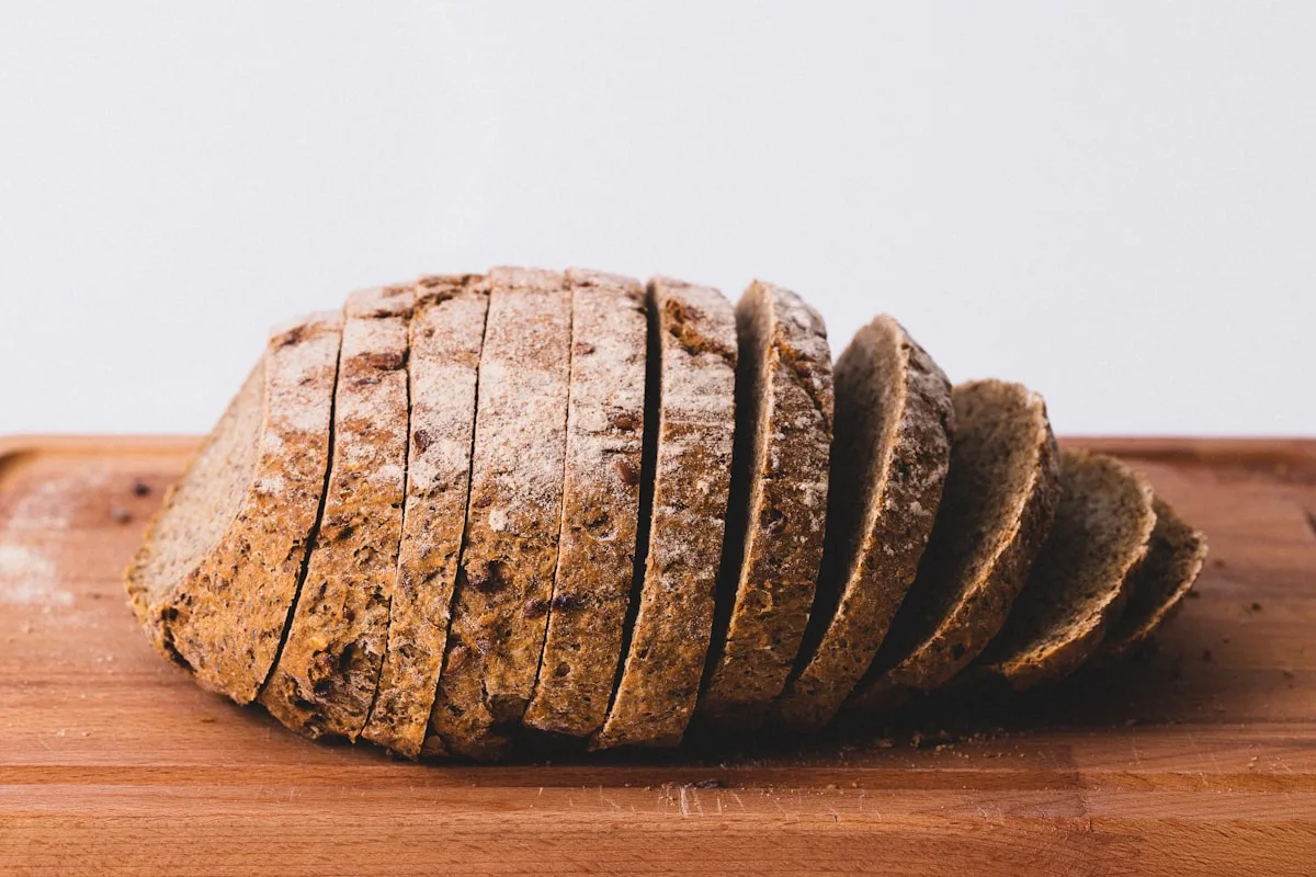 Fresh loaves packed into a linen bread basket