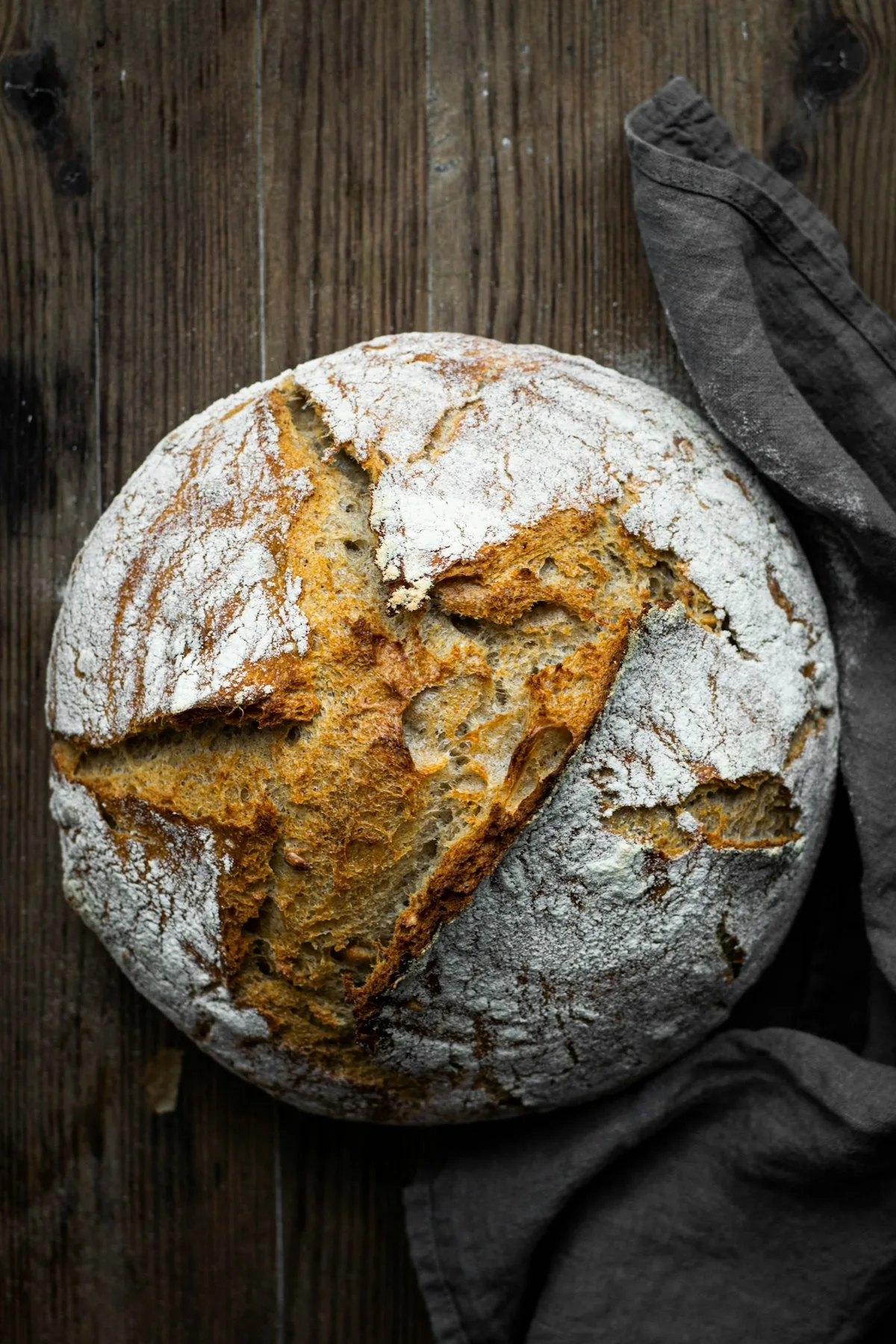 Open honeycomb crumb of a naturally leavened sourdough country loaf